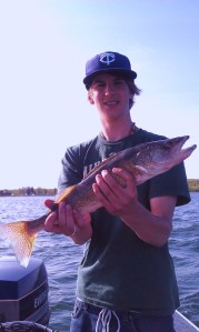 Ben with his walleye on Mille Lacs Lake, MN.  Fishing opener 2012.